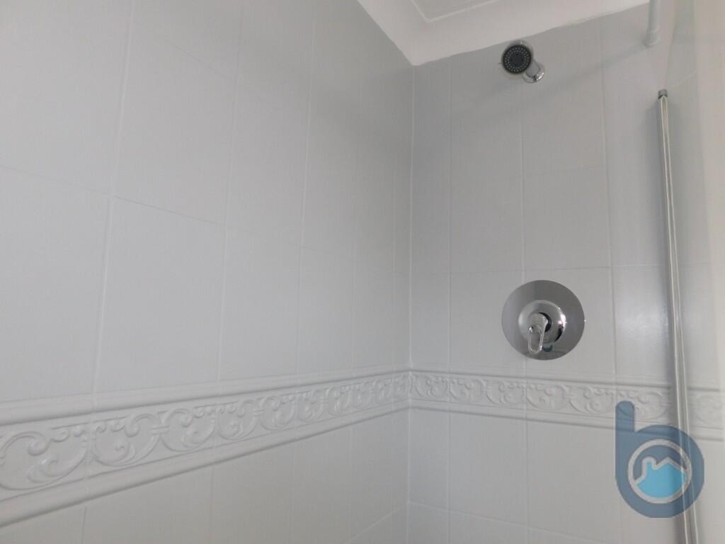 Shower over bath