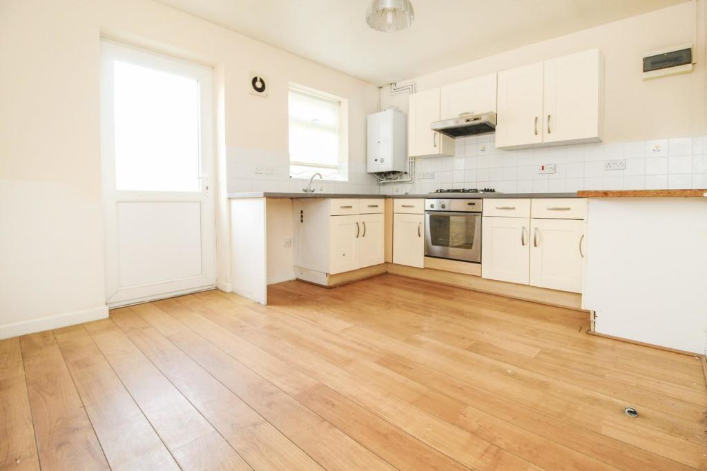 Kitchen with rear back door.jpg