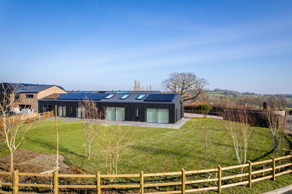 South West facing rear garden, overlooking communal grounds