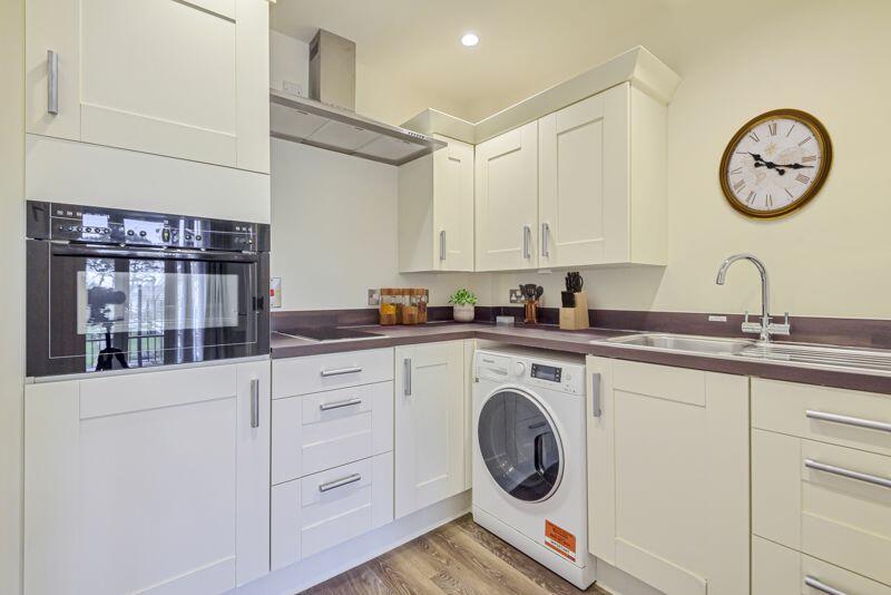 Kitchen with built-in appliances