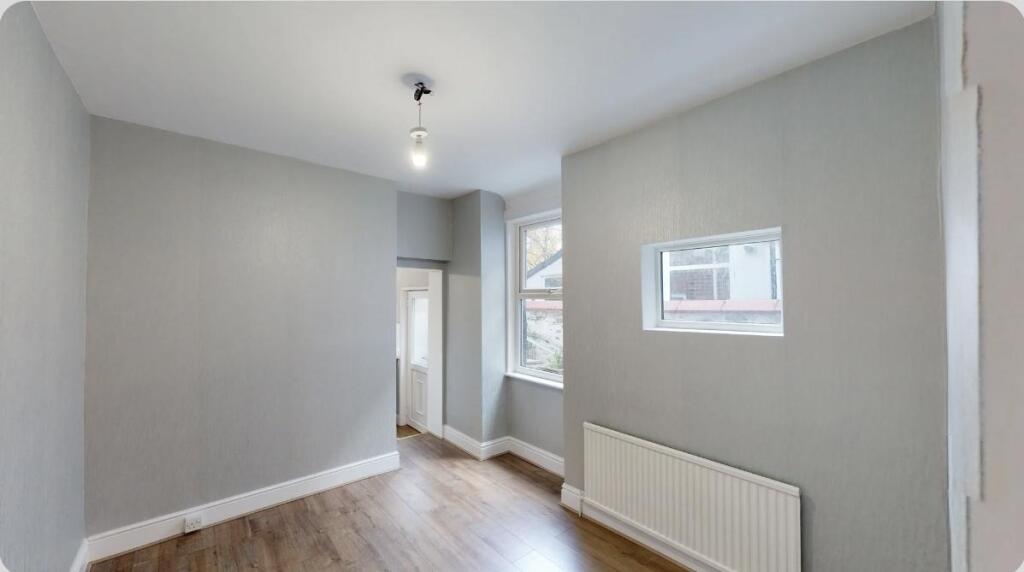 A clean and well-maintained hallway featuring l...