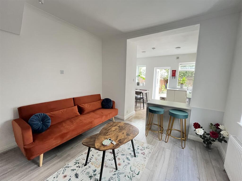 sitting room and kitchen.jpeg