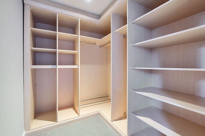 First bedroom walk-in wardrobe