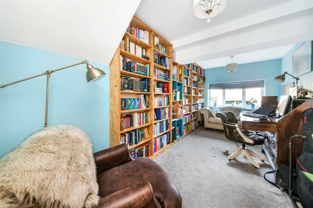 FAMILY ROOM OR POTENTIAL TO BE BEDROOM FIVE