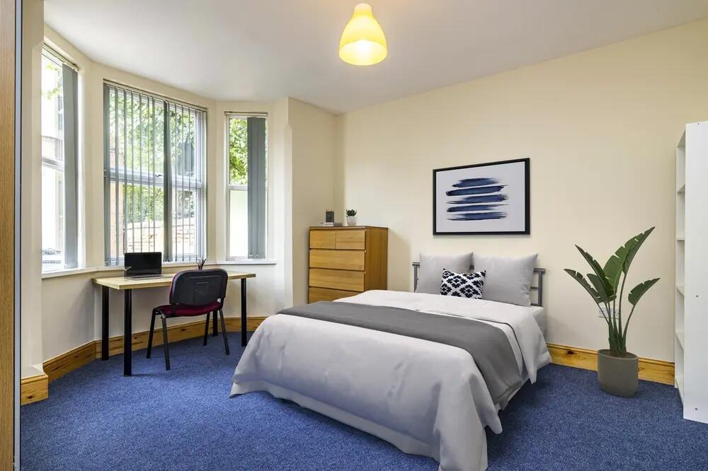 Bright and tidy double bedroom featuring a spac...