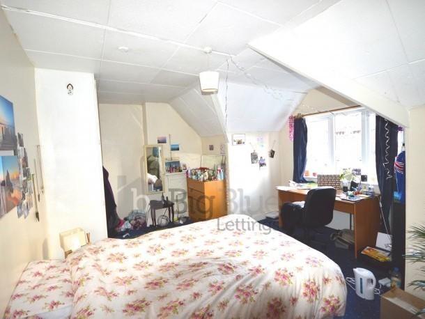 Bright and inviting master bedroom featuring a ...