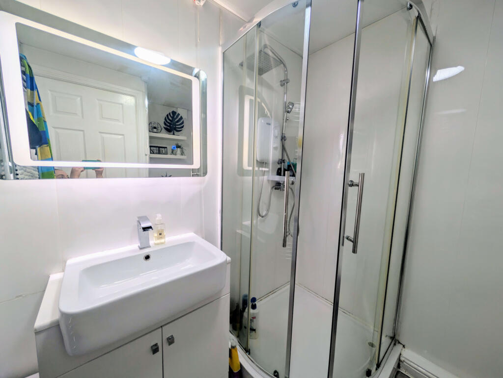 DOWNSTAIRS SHOWER ROOM