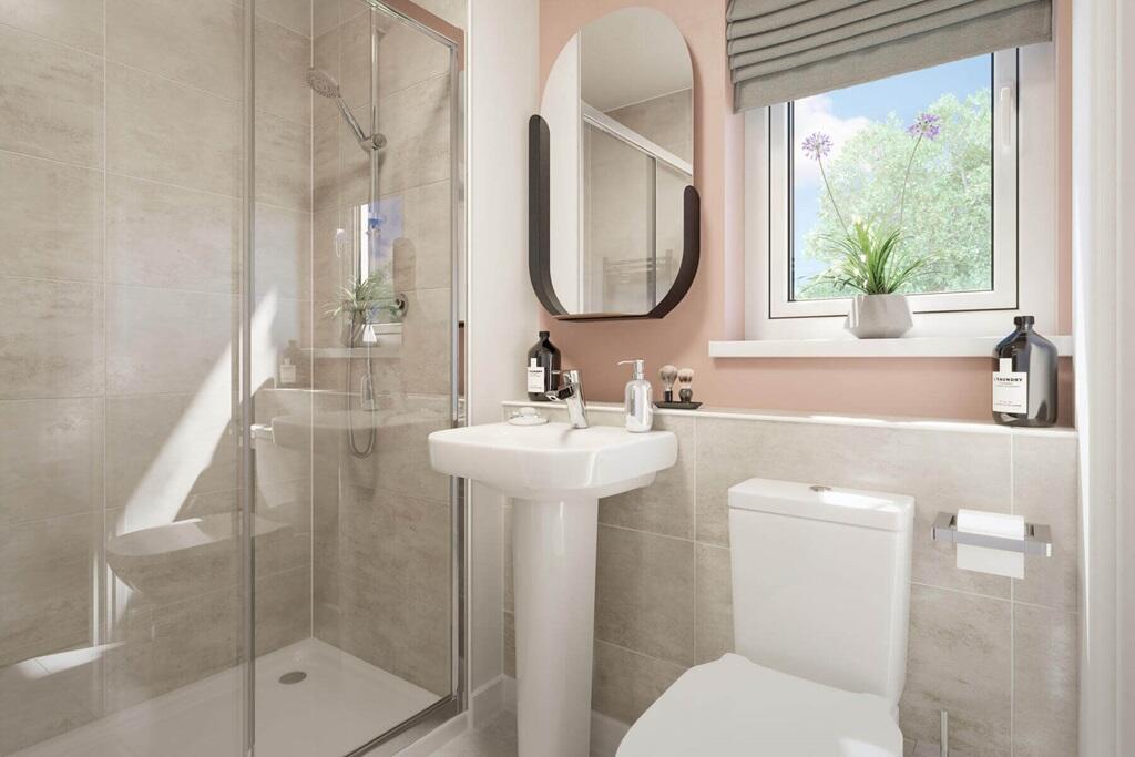 Bedroom 1 also hosts a private en-suite shower room