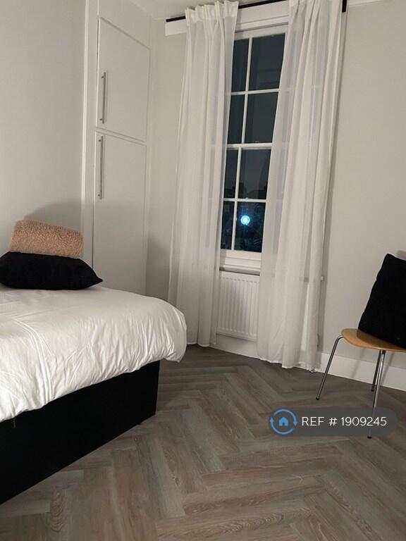 2nd Bedroom With Built In Storage. View Of Garden