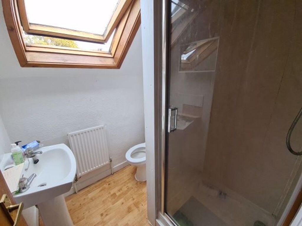 A clean and well-maintained bathroom featuring ...