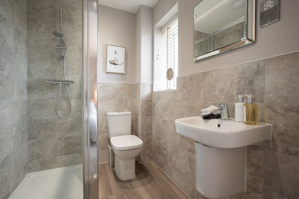 En suite shower room away from the family