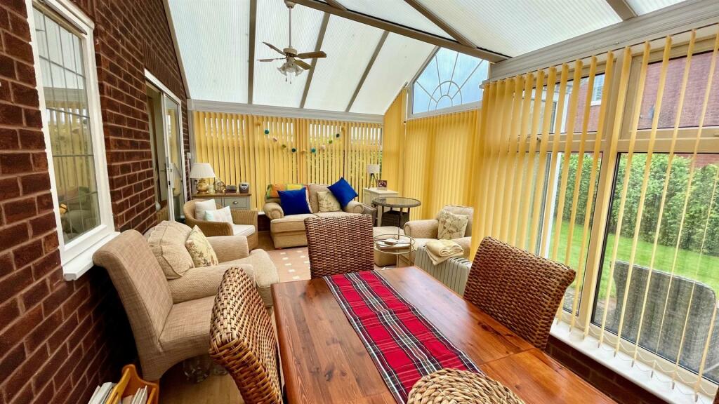 L-SHAPED CONSERVATORY