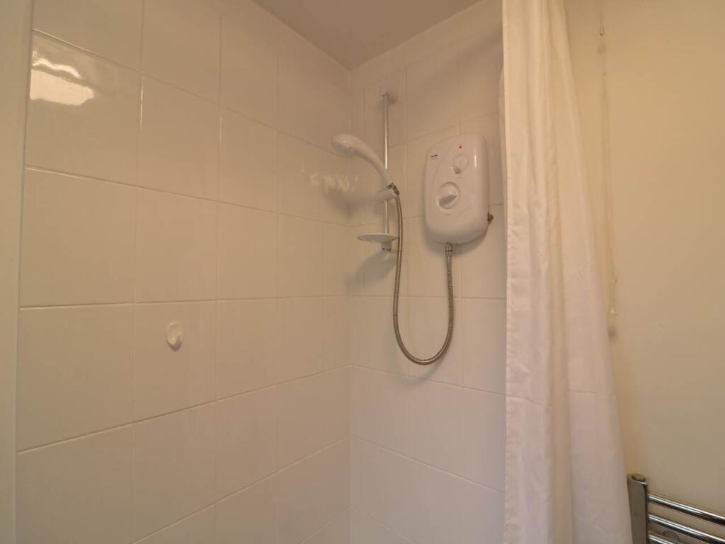 Shower over bath