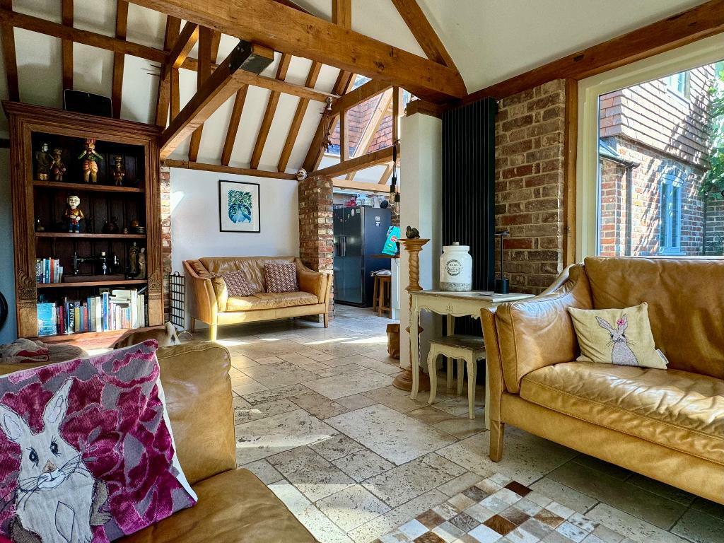 Living area with vaulted ceilings