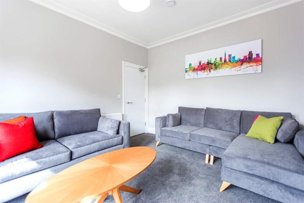 This stylish living room features modern furnis...