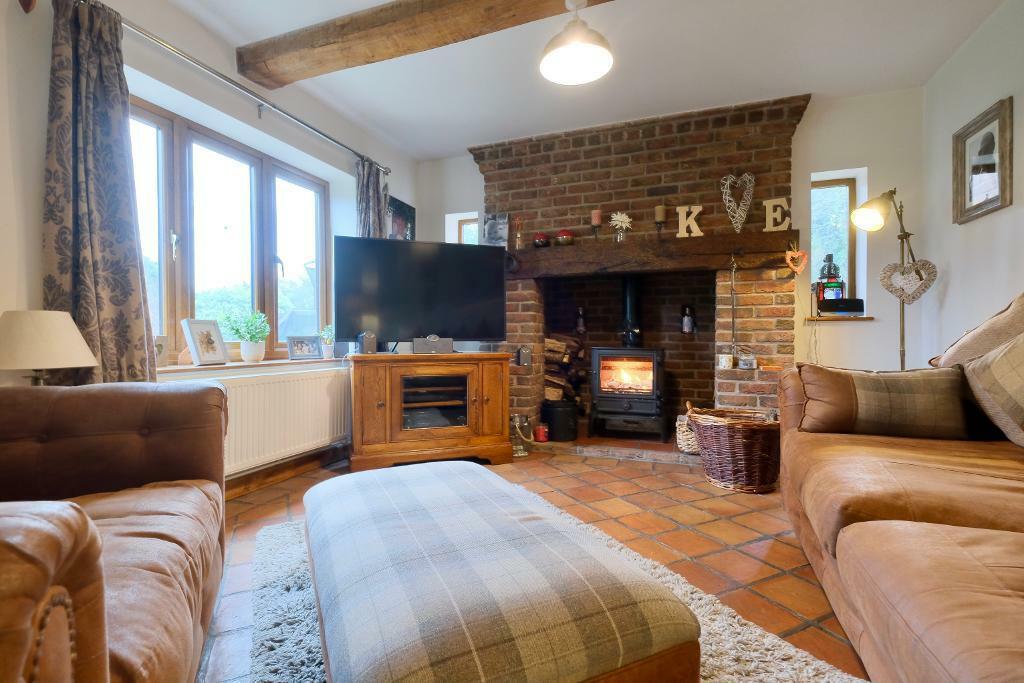 Sitting room with cosy log burner