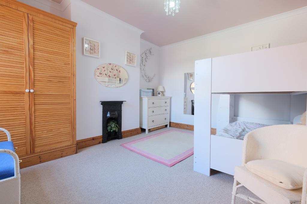Bedroom 2, fireplace and storage