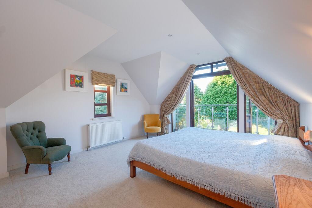 Master bedroom with balcony view