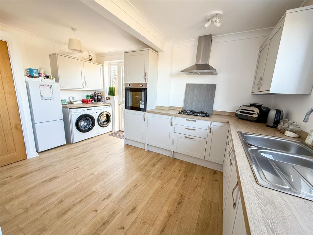ALTERNATE VIEW OF KITCHEN