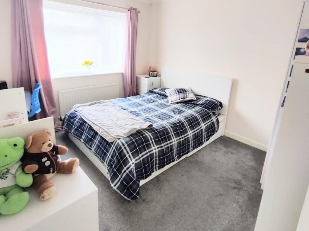 SECOND BEDROOM
