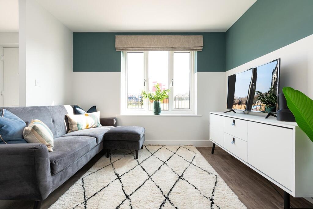 The lounge is a versatile space that leads through to the kitchen/dining area