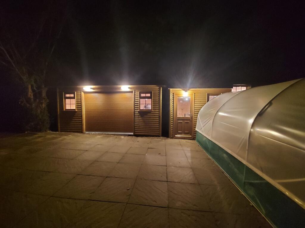 Outbuilding and Car parking 