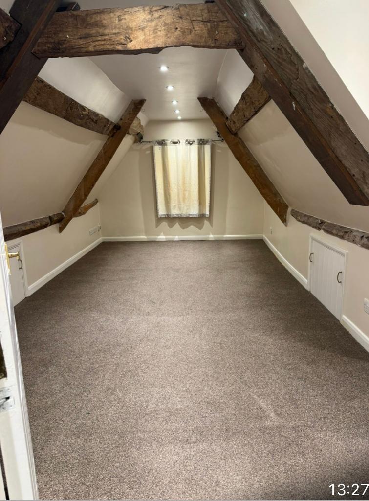 Main Bedroom with exposed beams