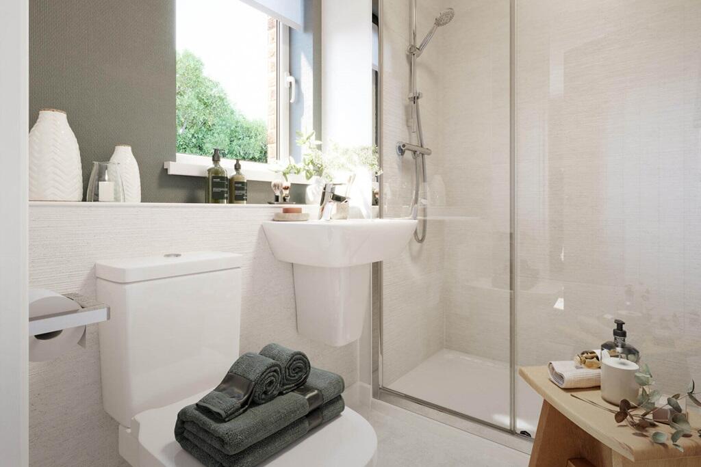 Bedroom 1 also features a private en suite shower room