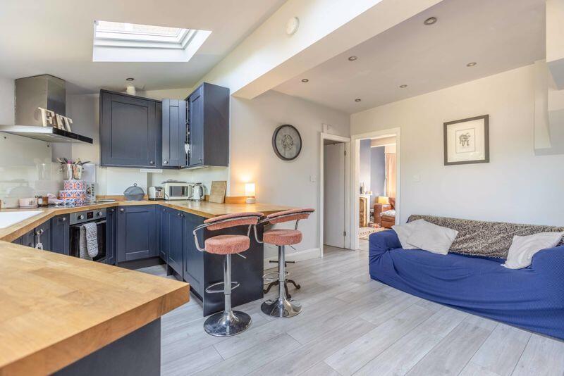 Kitchen opening to Dining area