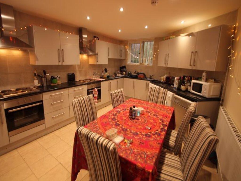 A modern kitchen featuring ample cabinetry, int...