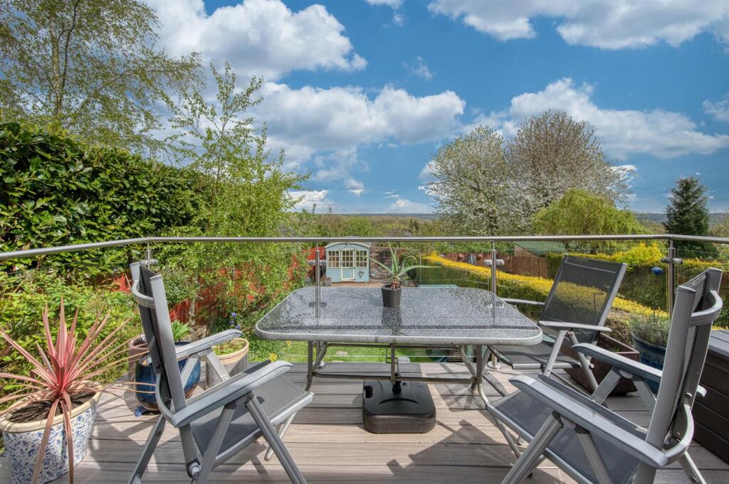 Elevated decking to summer house.jpg