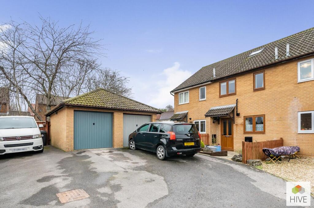 Garage (left) and parking in front/to side