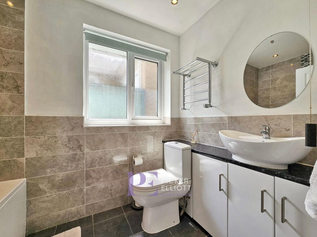 RE FITTED BATHROOM