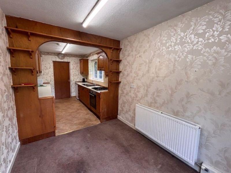 Dining Area to Kitchen
