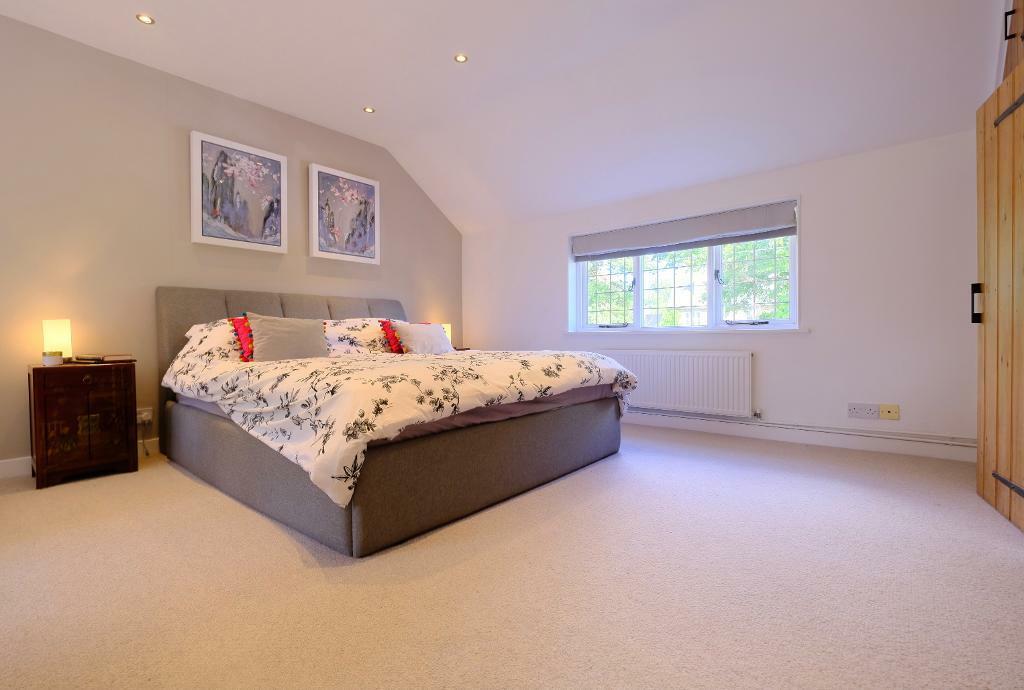 Main bedroom with fitted wardrobes