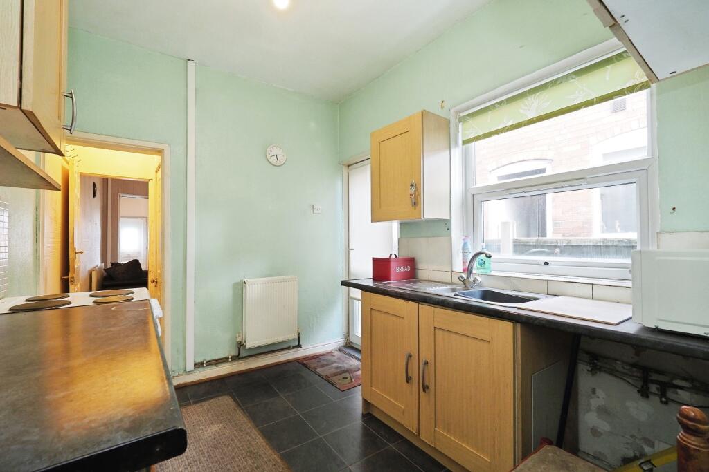 Kitchen with Outside Access and Separate Utility
