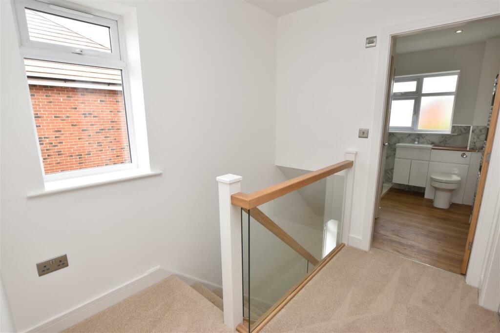 FIRST FLOOR LANDING