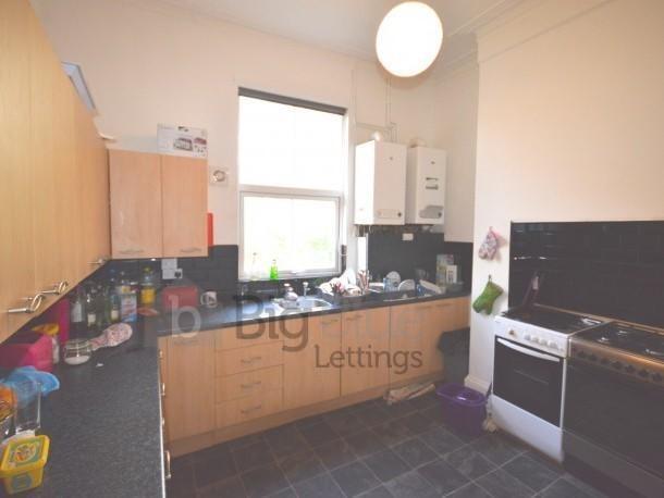 Bright kitchen with ample natural light from a ...