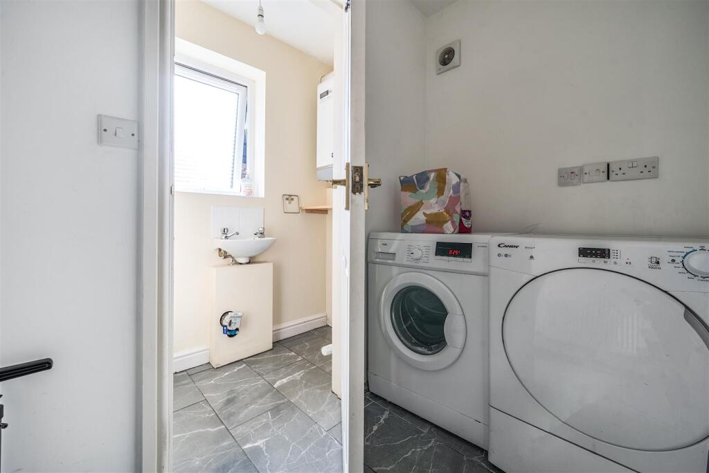 UTILITY ROOM AND W.C