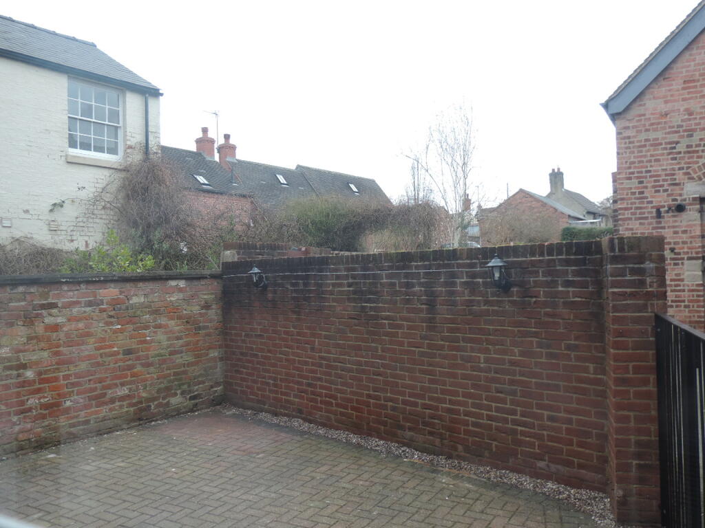 rear gated patio garden/parking