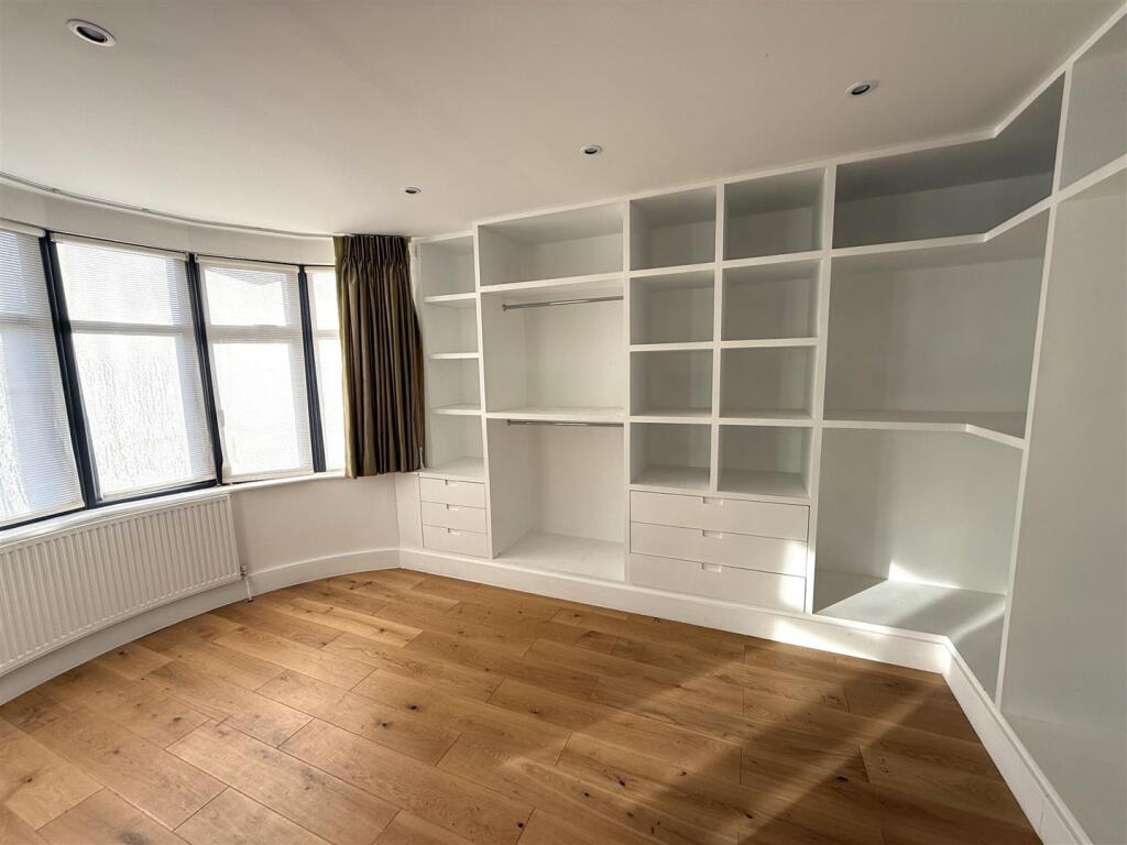 Ensuite Dressing Room to Bed 1.jpeg