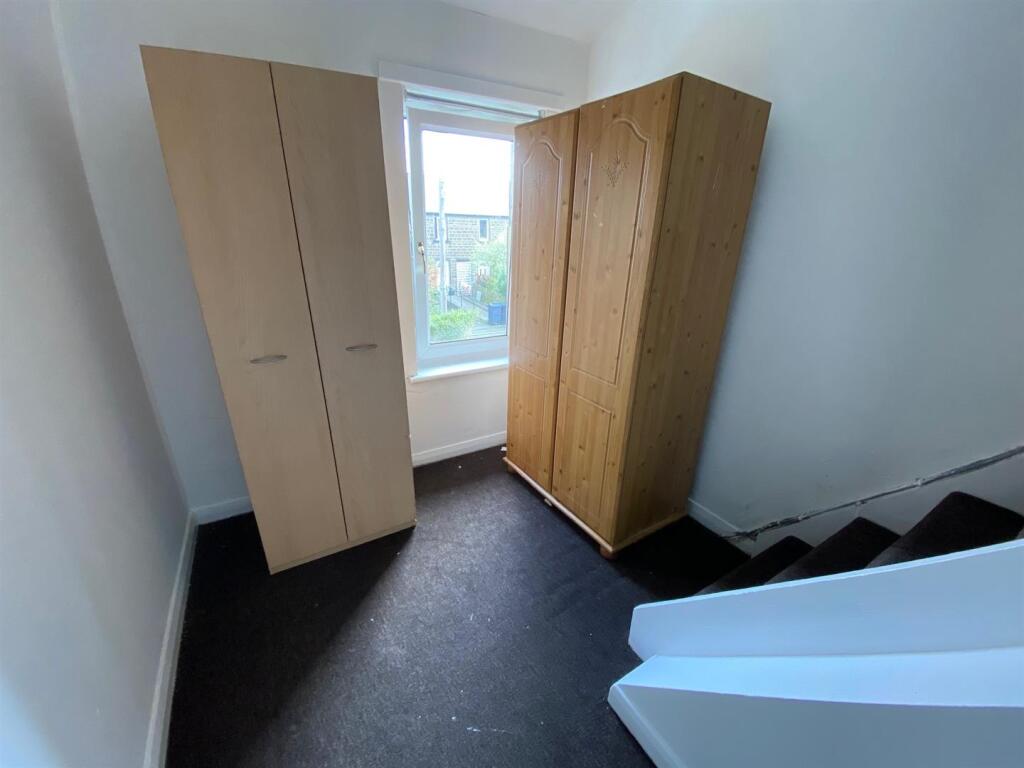 study with staircase to attic.jpg