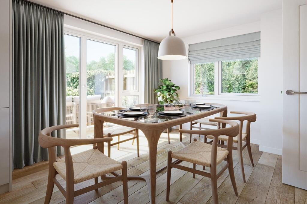 Double doors lead out the the garden from the dining area