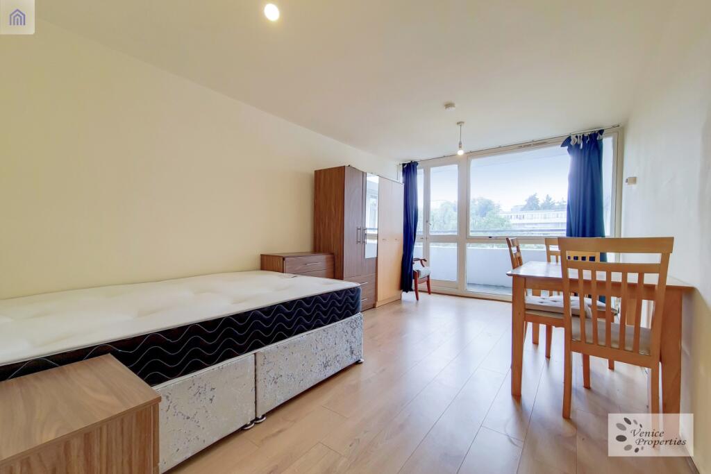 Bright and spacious living area featuring large...