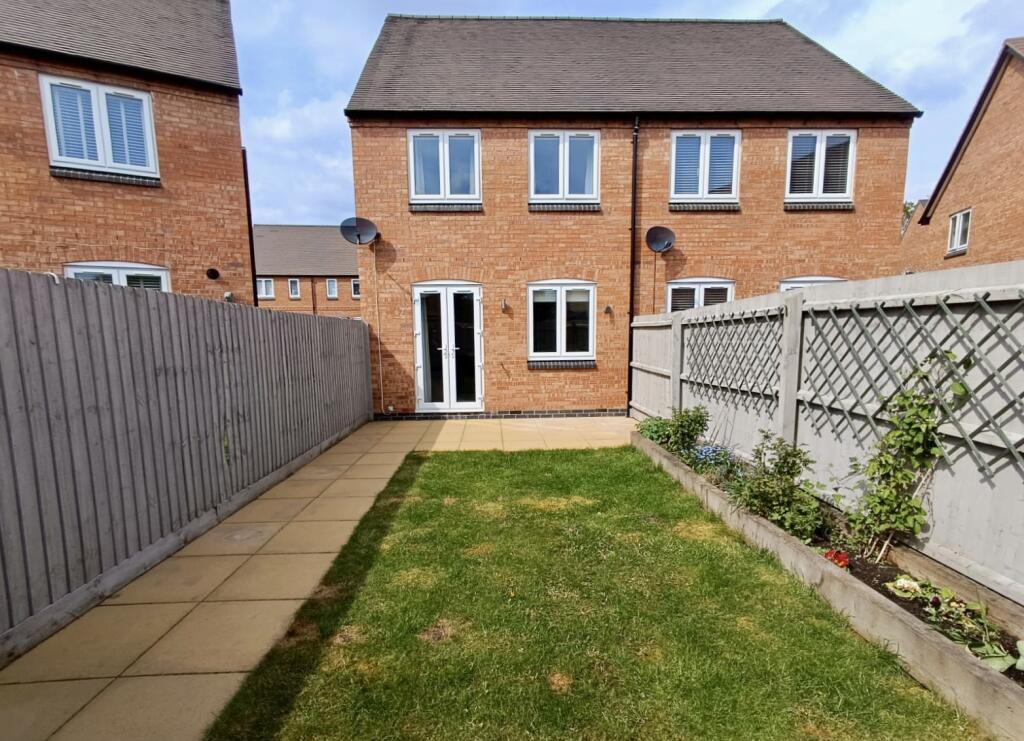 rear aspect and garden