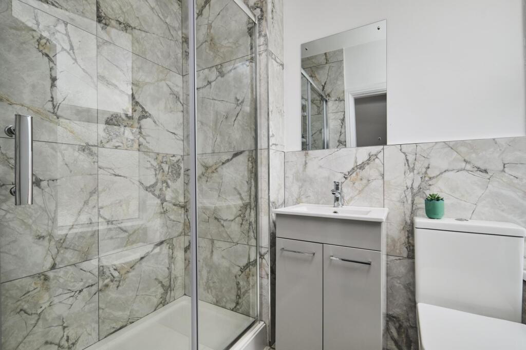 A clean and well-maintained bathroom with a mod...
