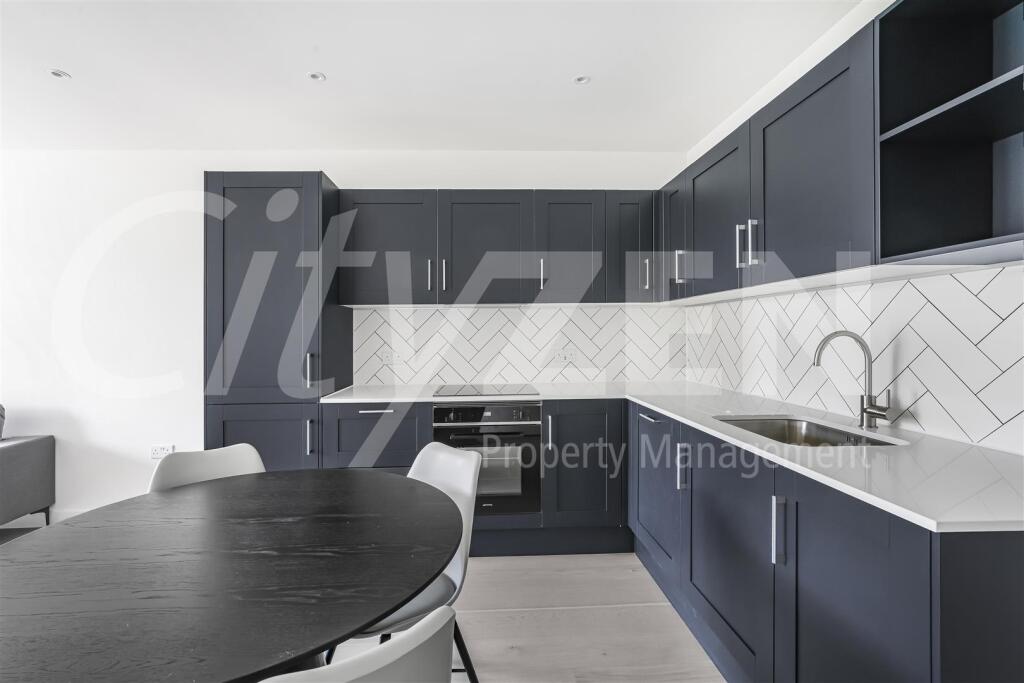 KITCHEN (PHOTO OF SIMILAR APARTMENT)