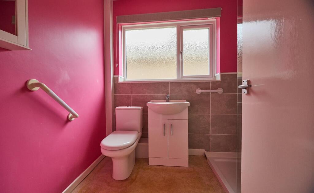 Refitted shower room to side