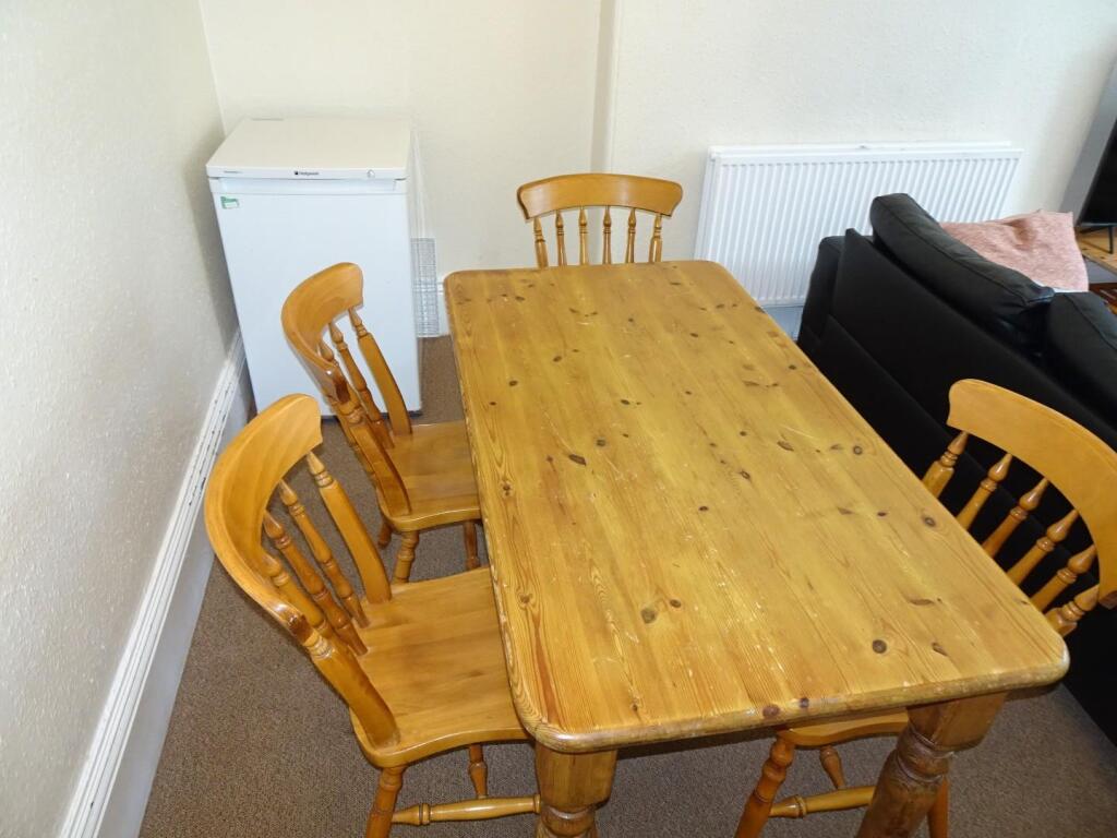 Dining table and chairs.JPG