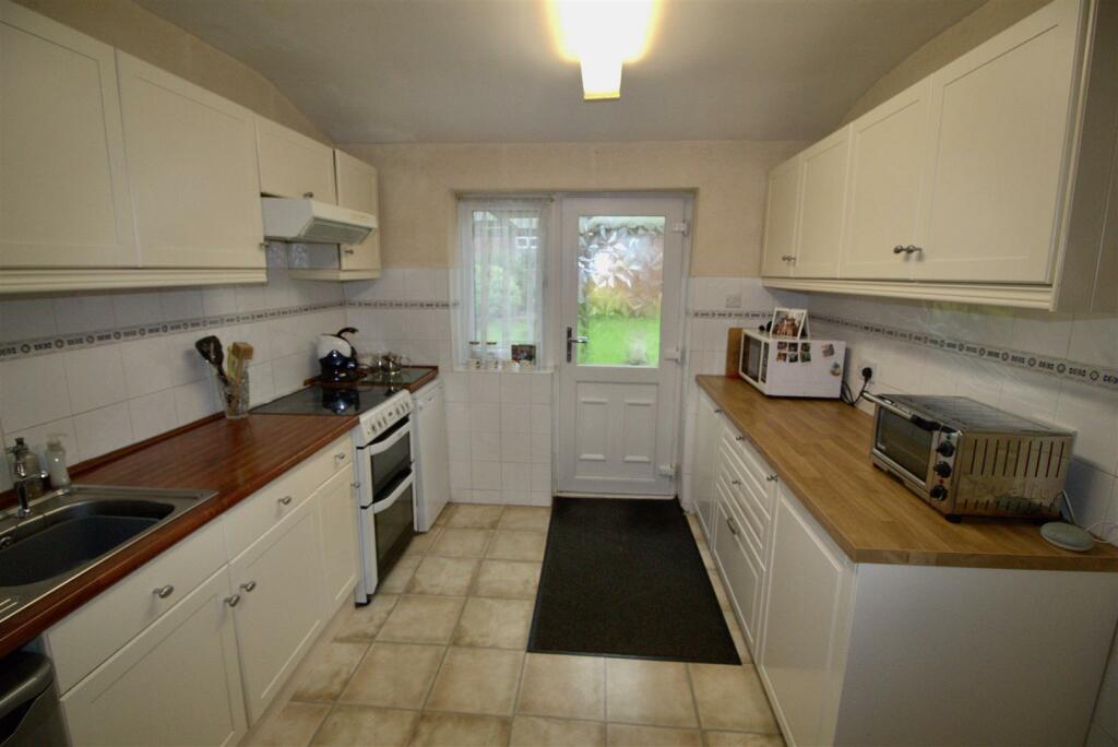 OPEN PLAN FAMILY ROOM/KITCHEN